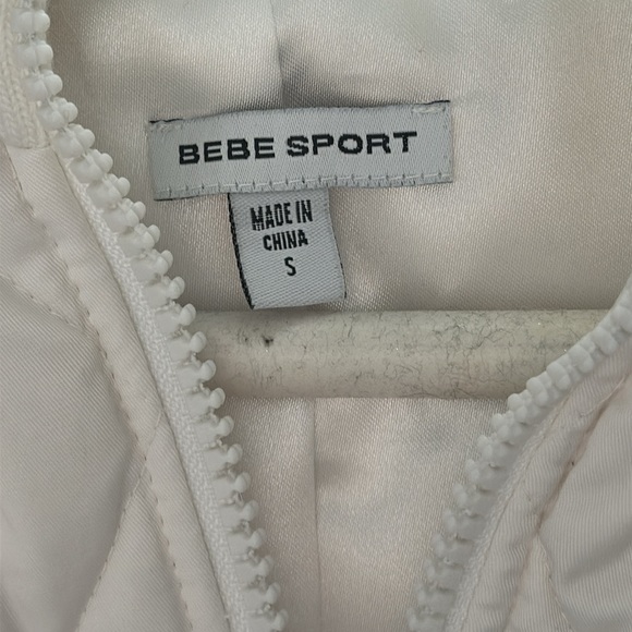Bebe small vest with hoodie in white with fuzzy trim and fuzzy balls - Picture 2 of 7